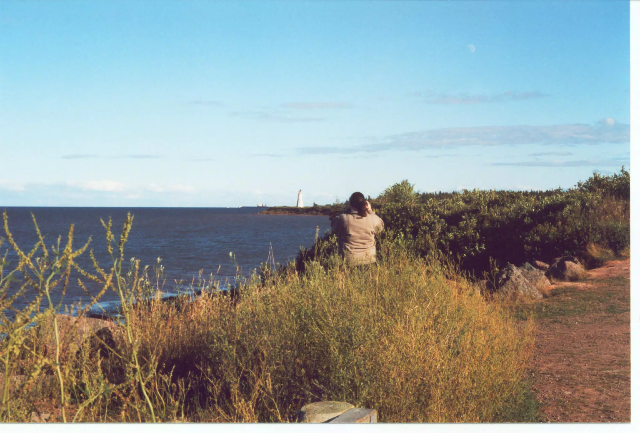 Dominica Miller in New Brunswick Photographing Lighthouse
