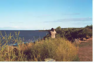 Dominica Miller in New Brunswick Photographing Lighthouse