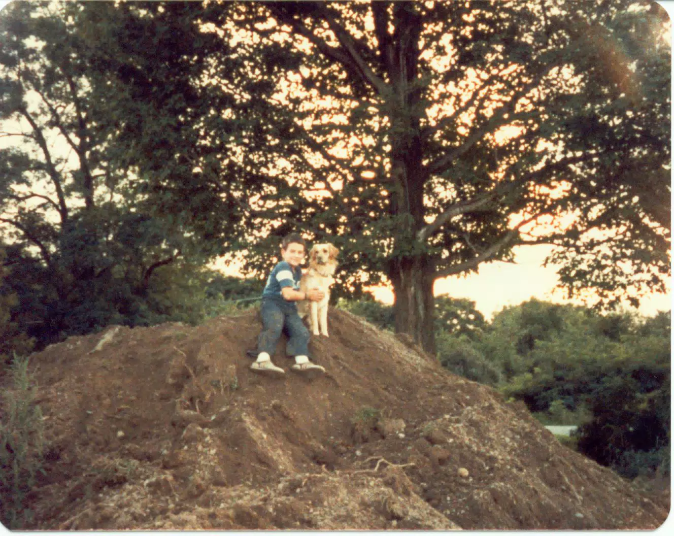 Scott Alan Miller and Lady on top of dirt pile