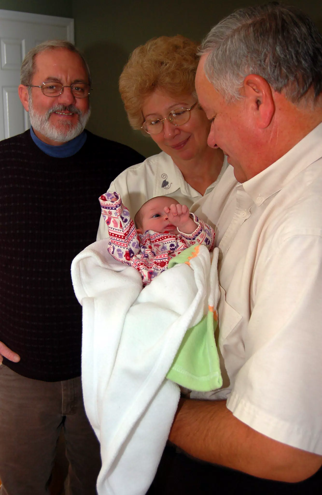 Uncle Leo, Aunt Sharon and Grandpa Miller with Baby Liesl