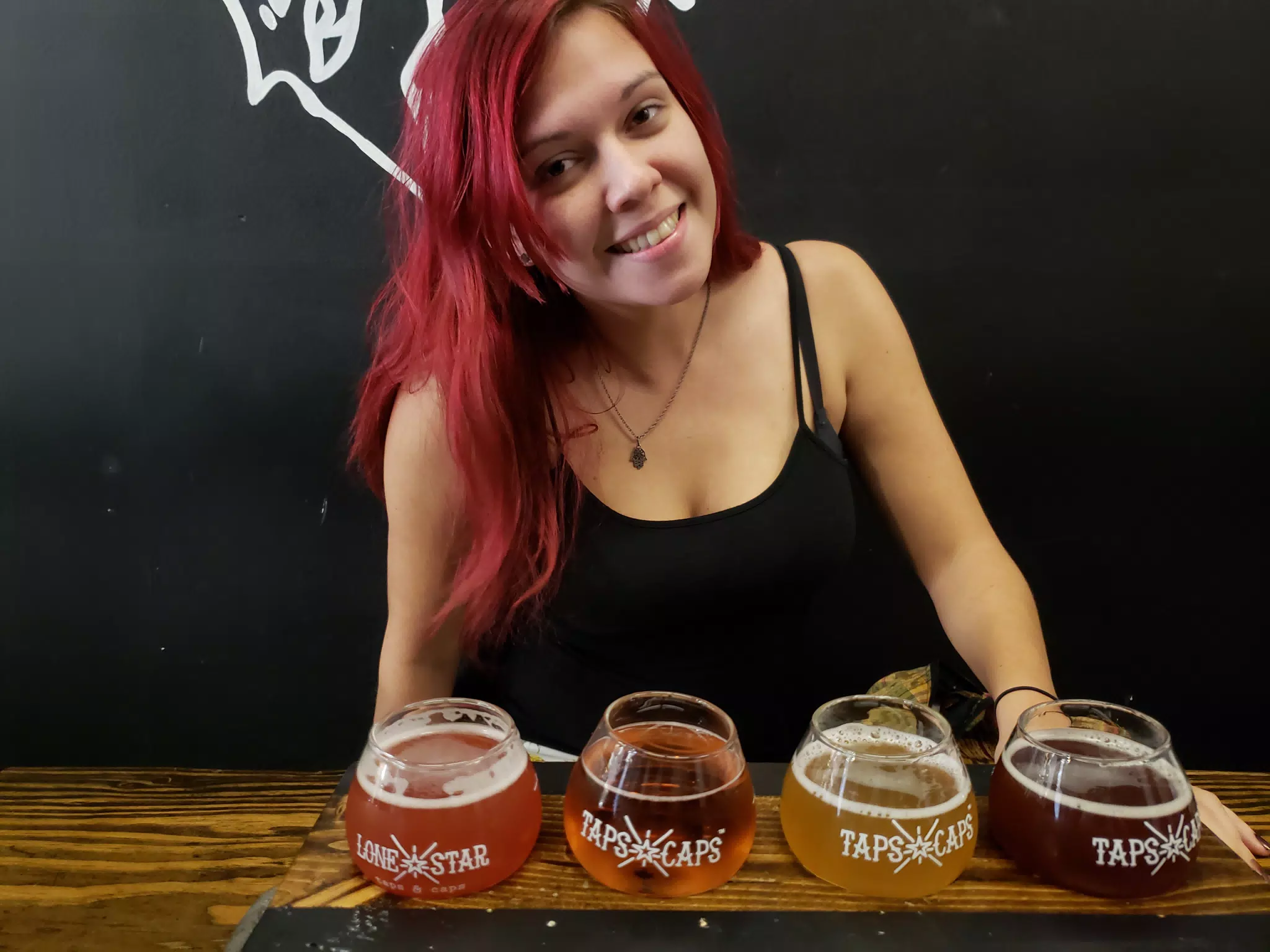 Rachel with Beer Flight at Taps & Caps