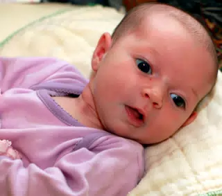 Liesl Relaxing on Her Boppy Pillow