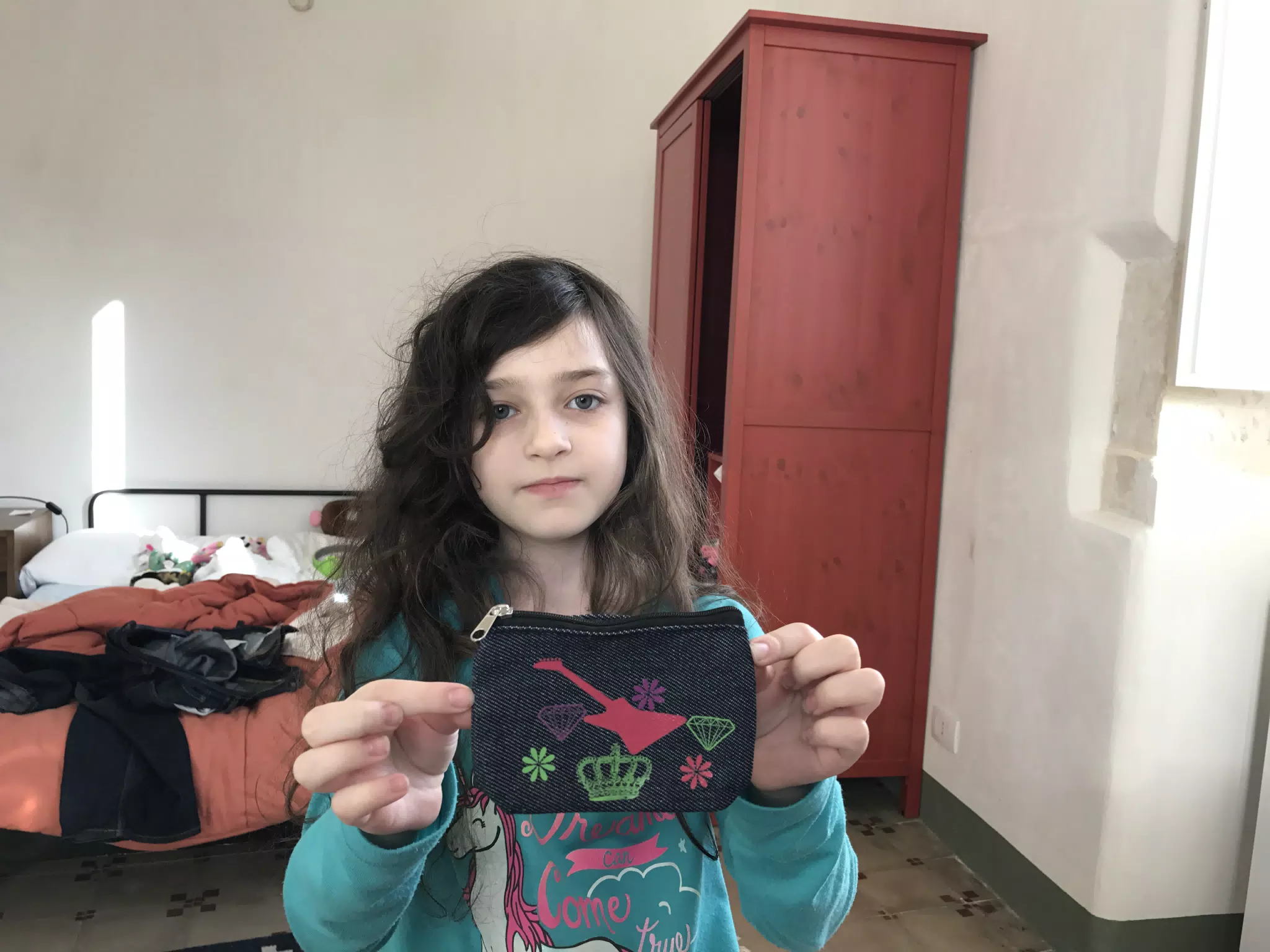 Liesl decorating her new purse.