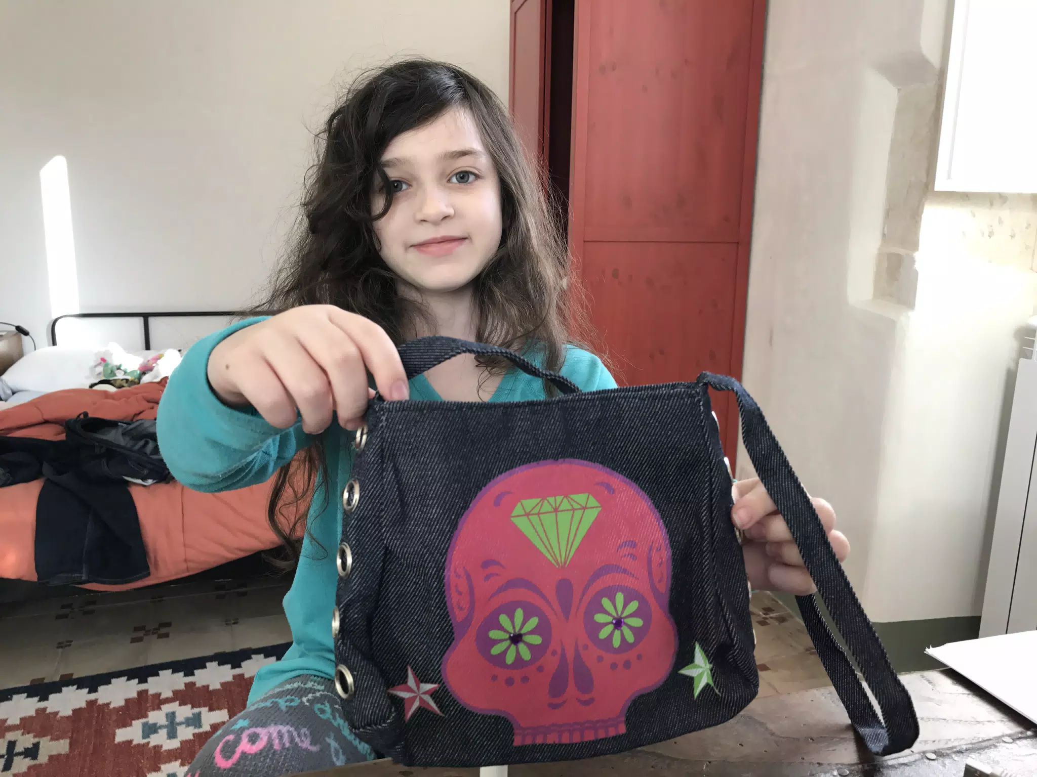 Liesl decorating her new purse.