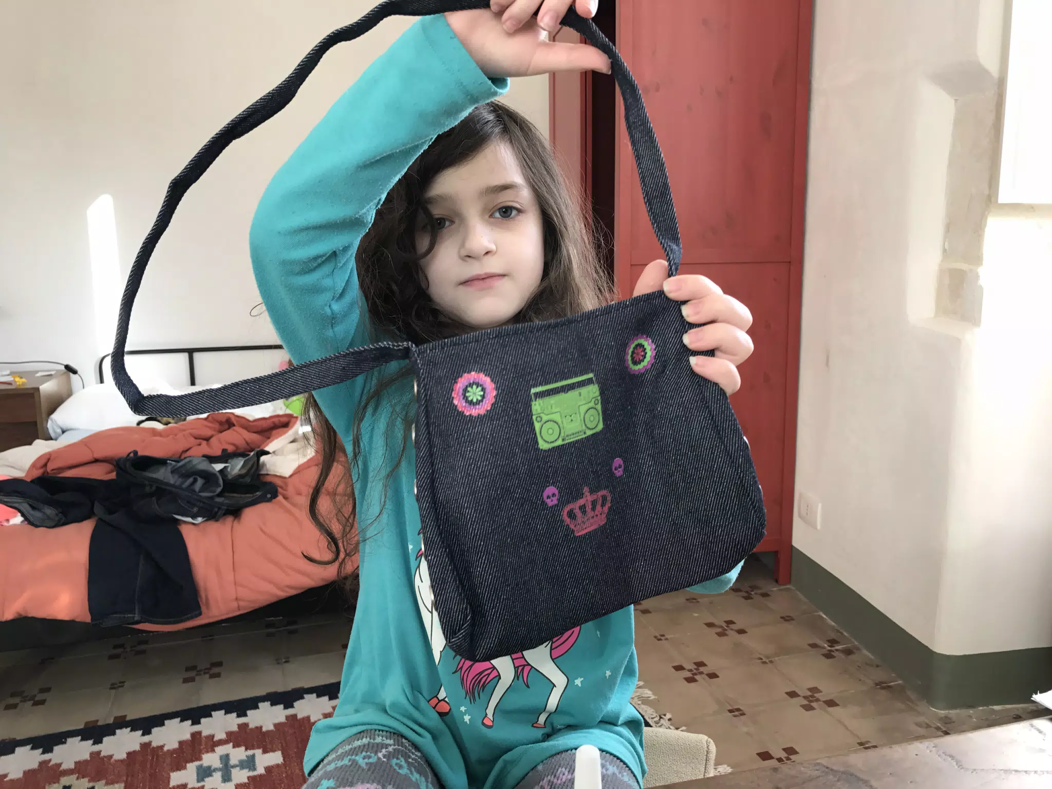 Liesl decorating her new purse.