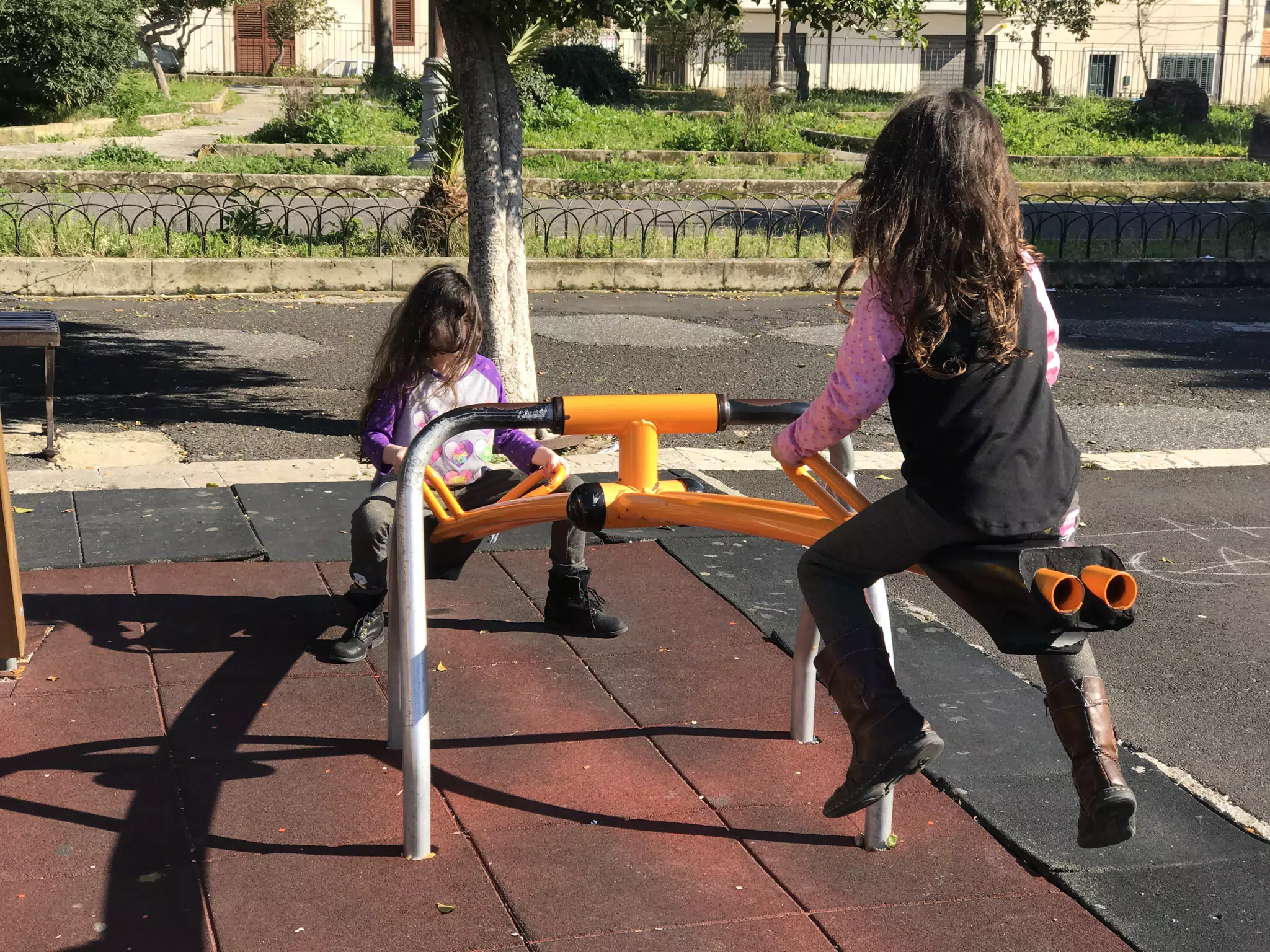 Liesl and Luciana on the Playground in Noto