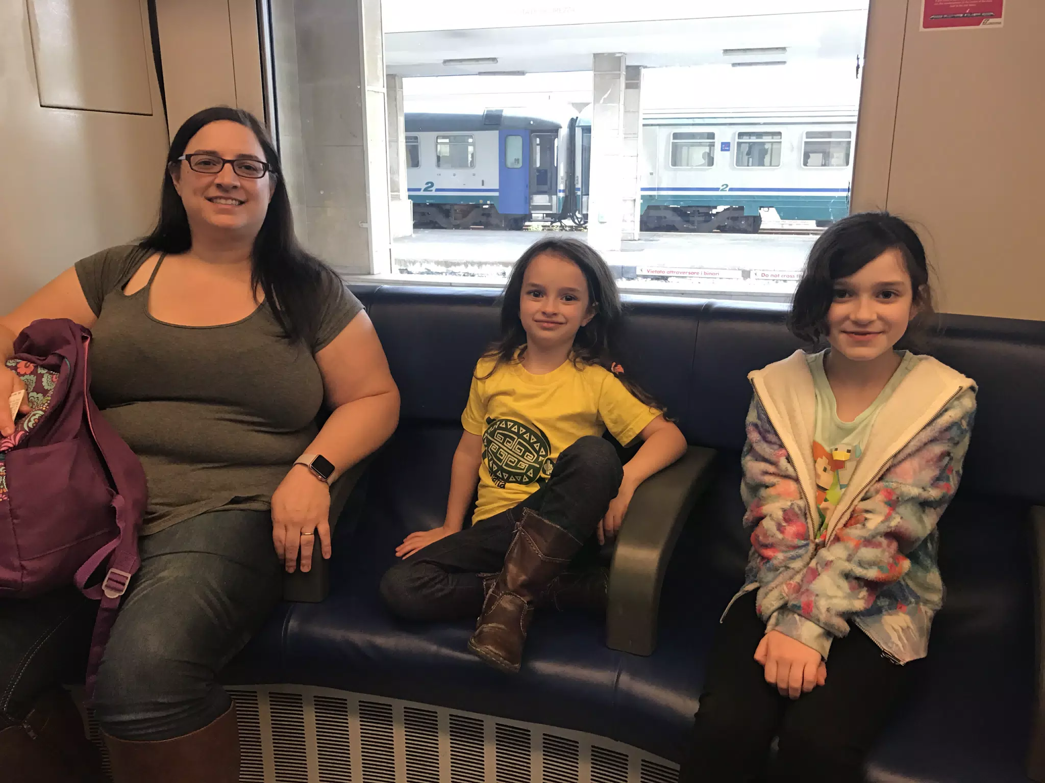 Family Riding the Train to Palermo