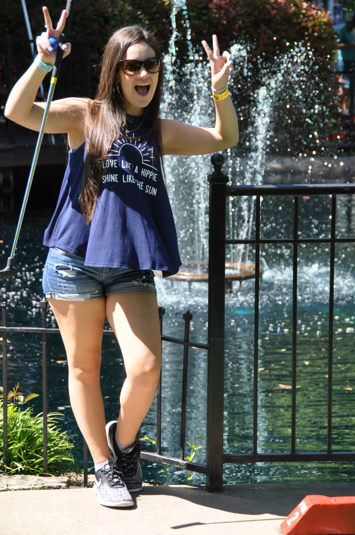 Emily Playing Mini Golf