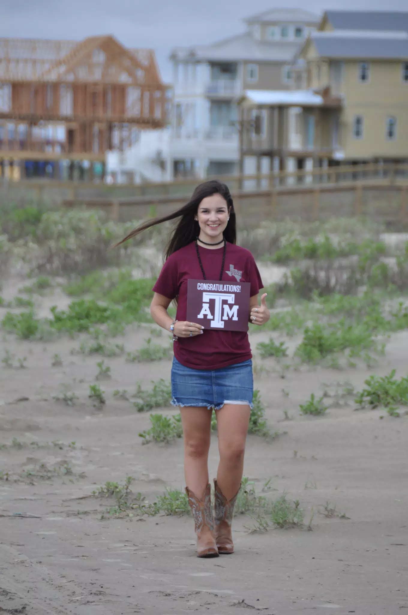 Emily Thumbs Up Aggies Sign