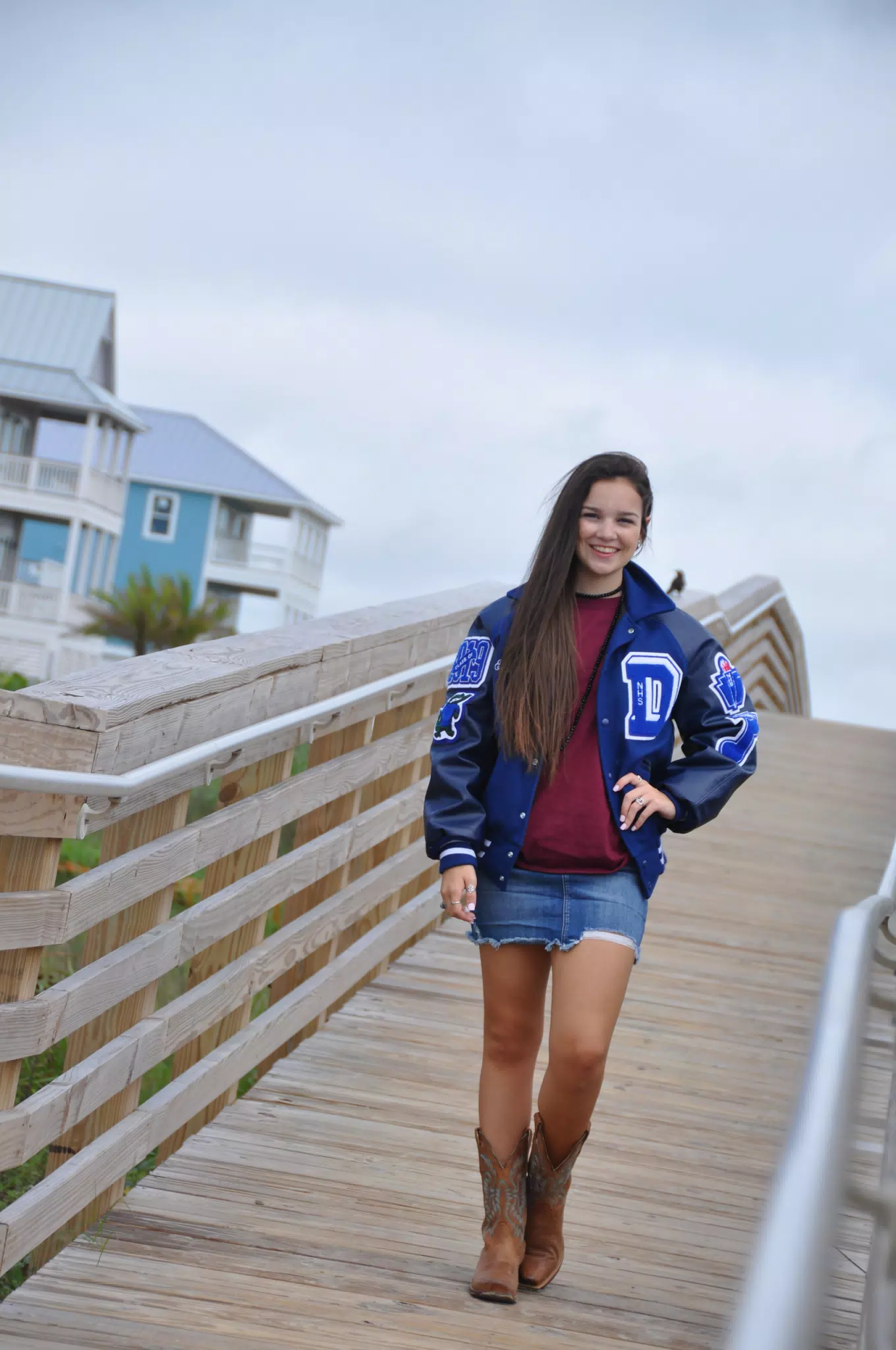 Emily on Galveston Boardwalk in Jean Skirt and Boots