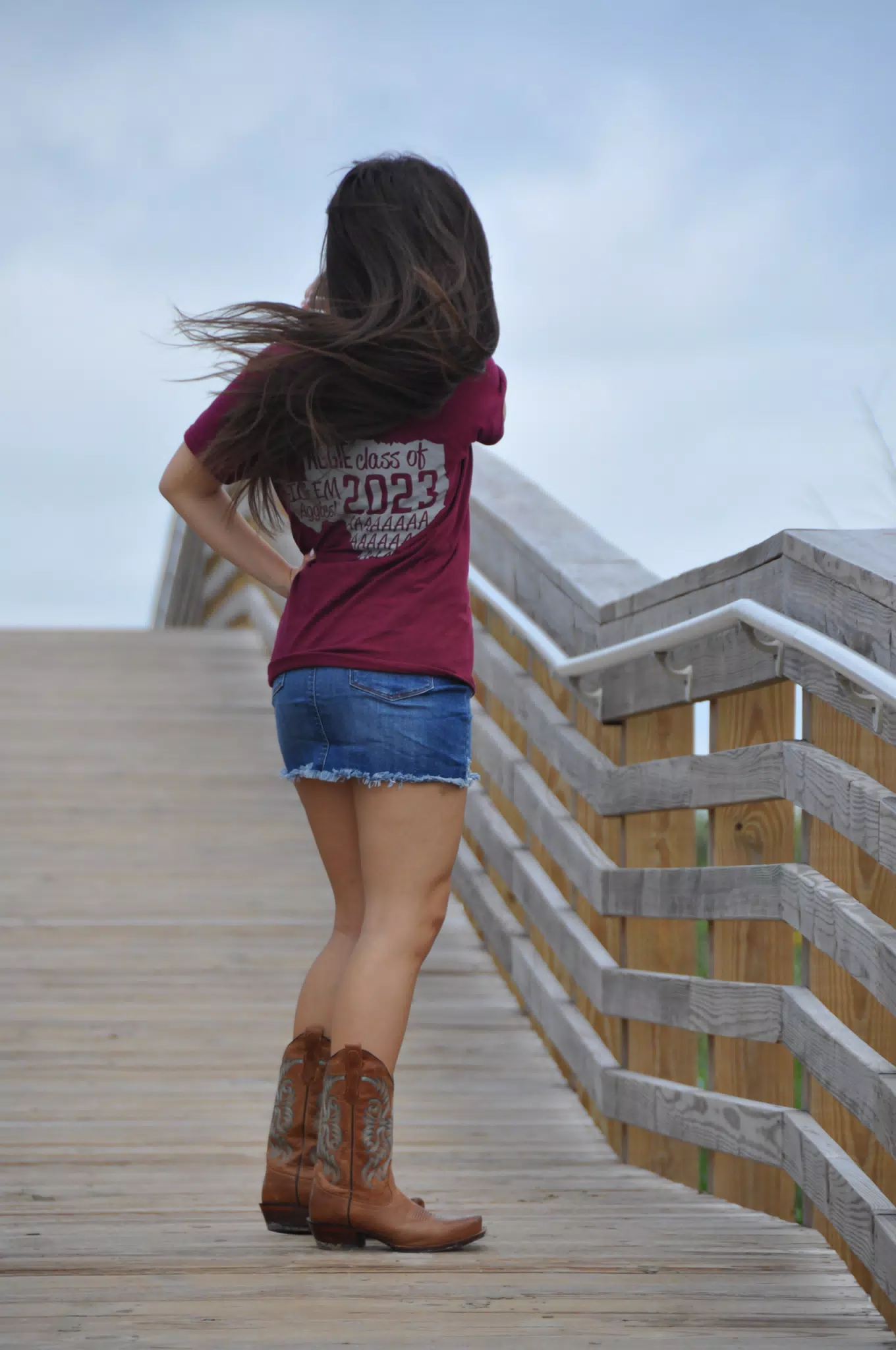 Teen Whipping Hair on Galveston Boardwalk