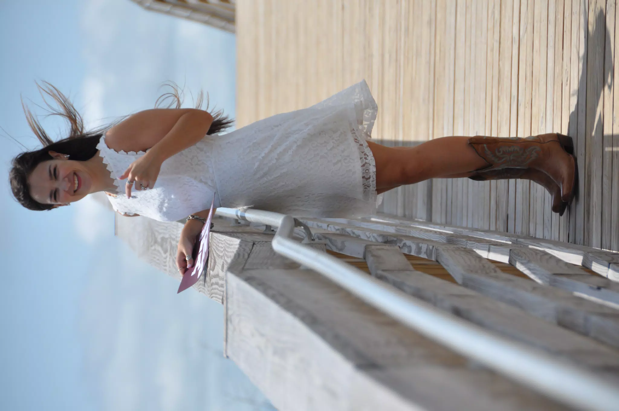 Girl in Wind with Sign