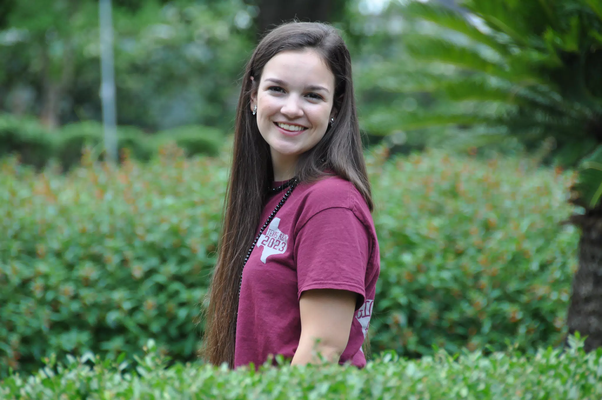 Brunette Beauty in Gardens in Galveston Modeling