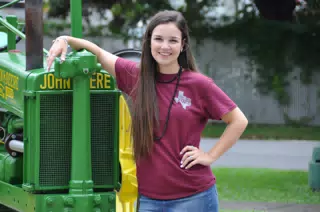 Teen on John Deere Tractor