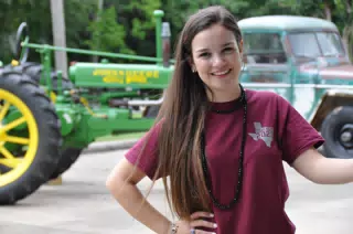 Emily with Antique John Deere