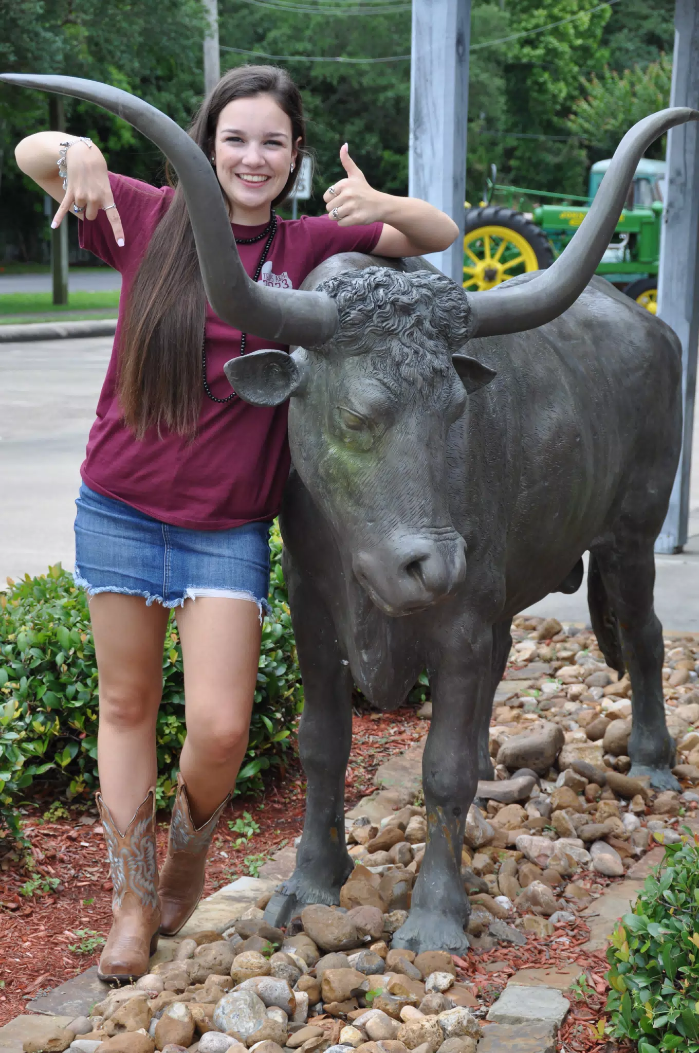 Brunette in Denim Skirt with Longhorn