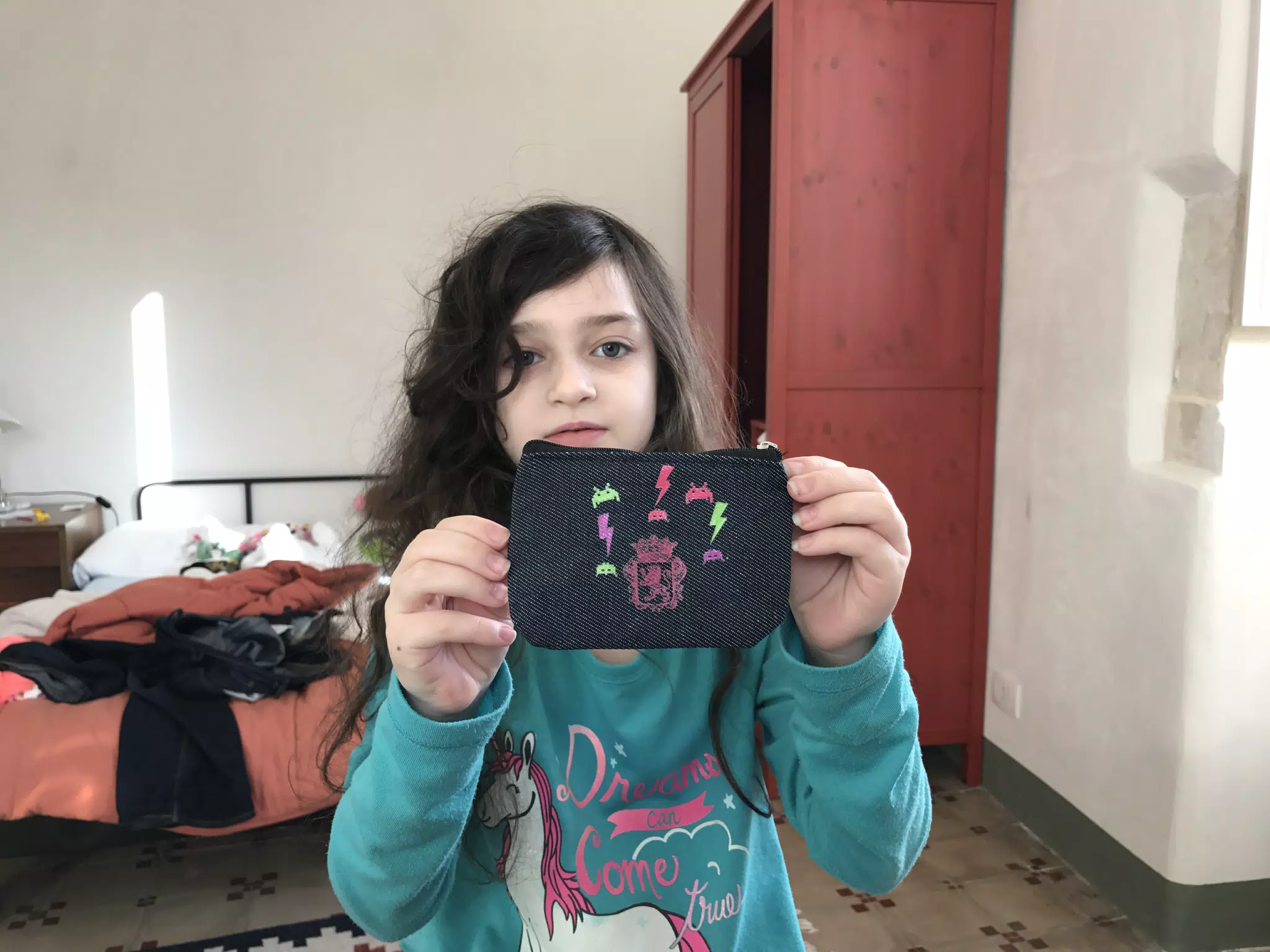 Liesl decorating her new purse.