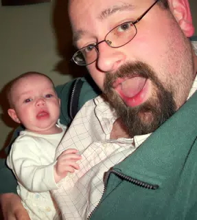 Liesl and Her Dad Holding Camera