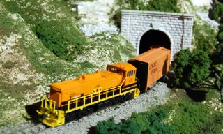 Genesee and Wyoming MP15DC RN45 Pulling Rolling Stock from Tunnel