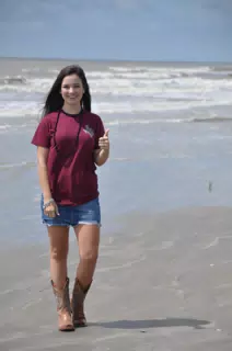 Emily Thumbs Up on Galveston Beach