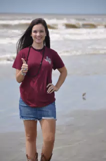 Emily Giving Thumbs Up on the Beach