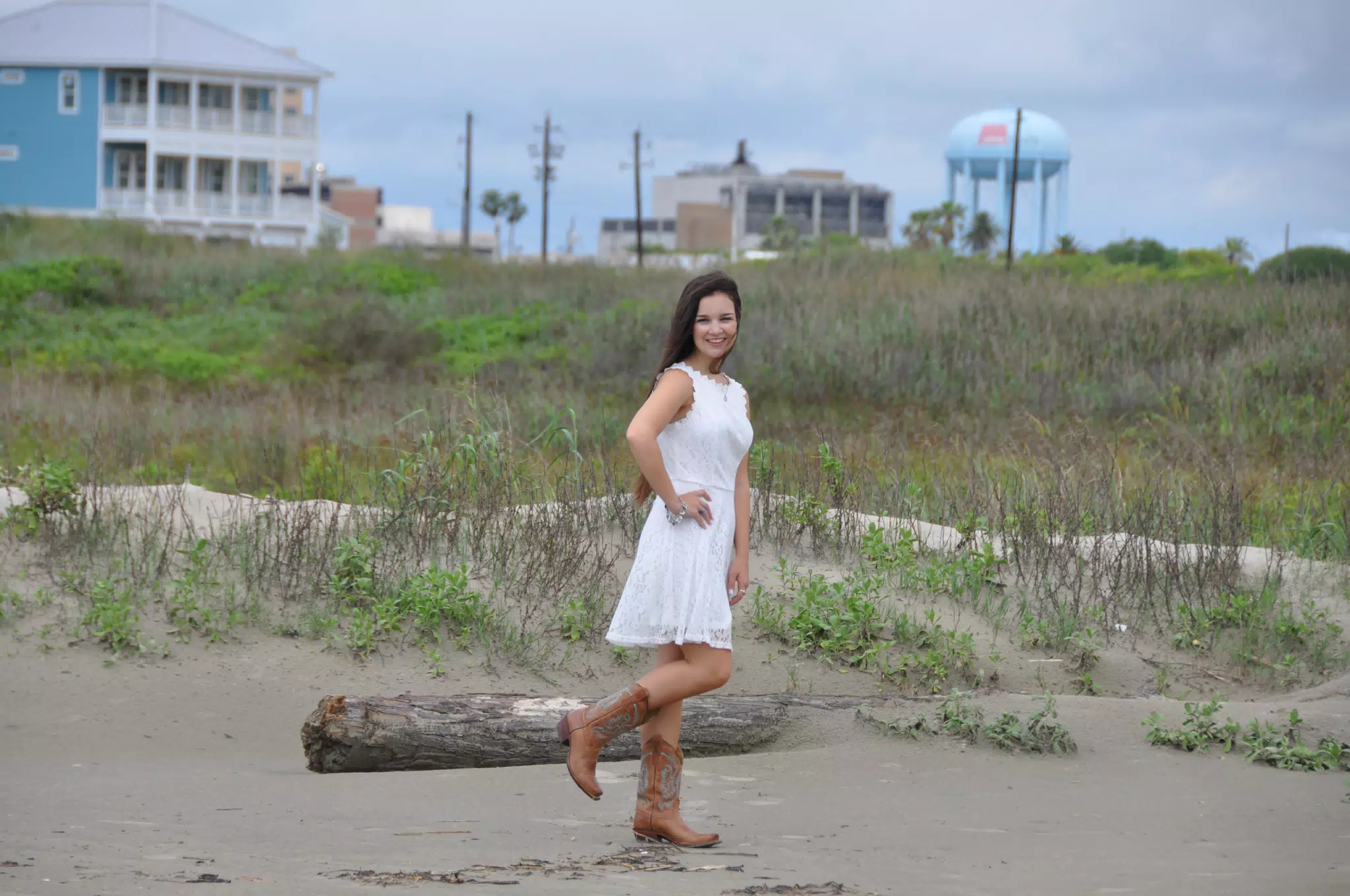Teen Model in White Dress and Cowboy Boots on Galveston Beach