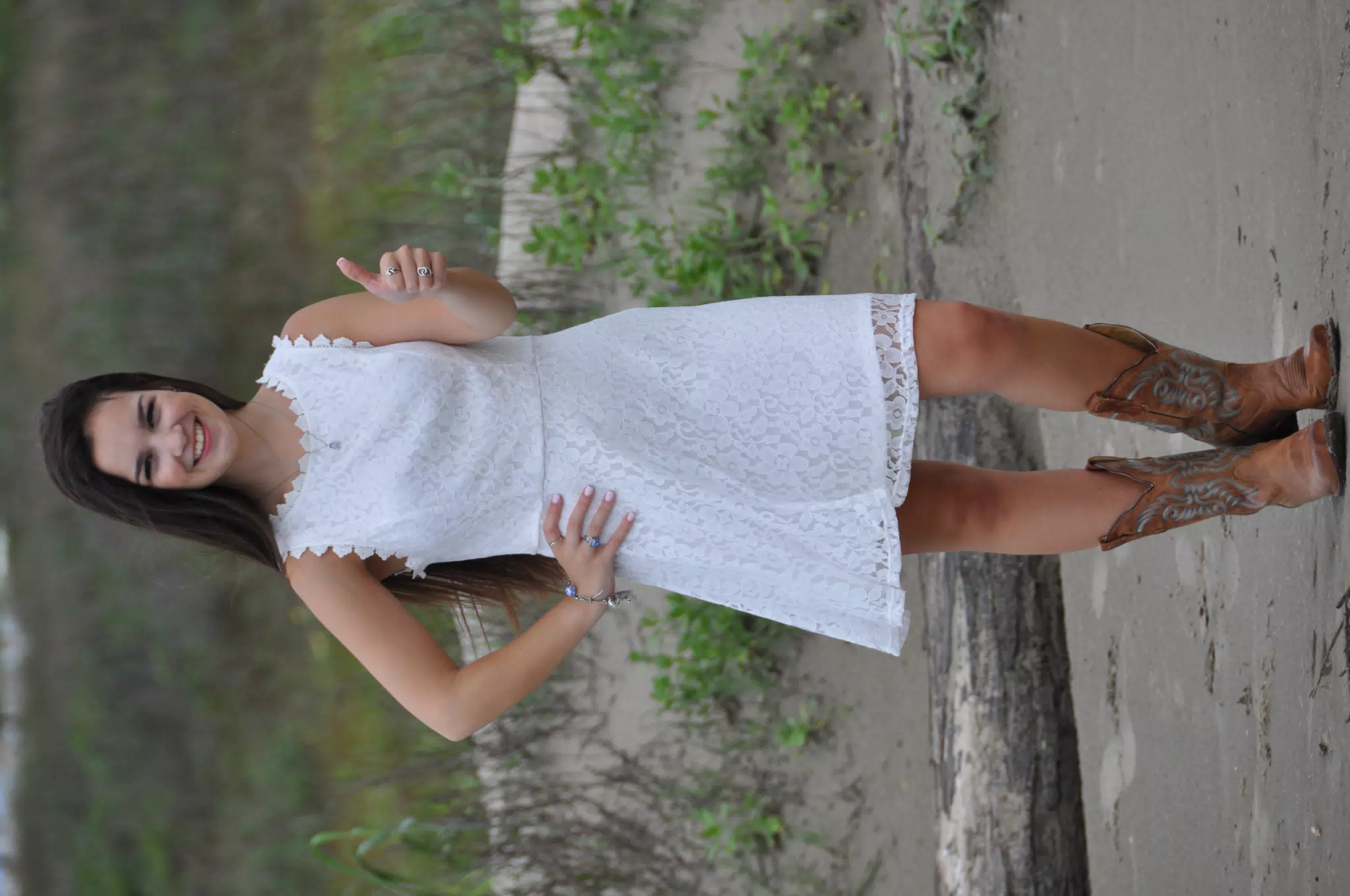 Girl in White Dress on Beach in Cowboy Boots