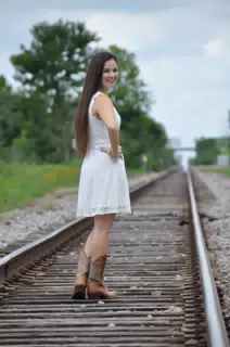 Emily Modeling on Railroad Tracks