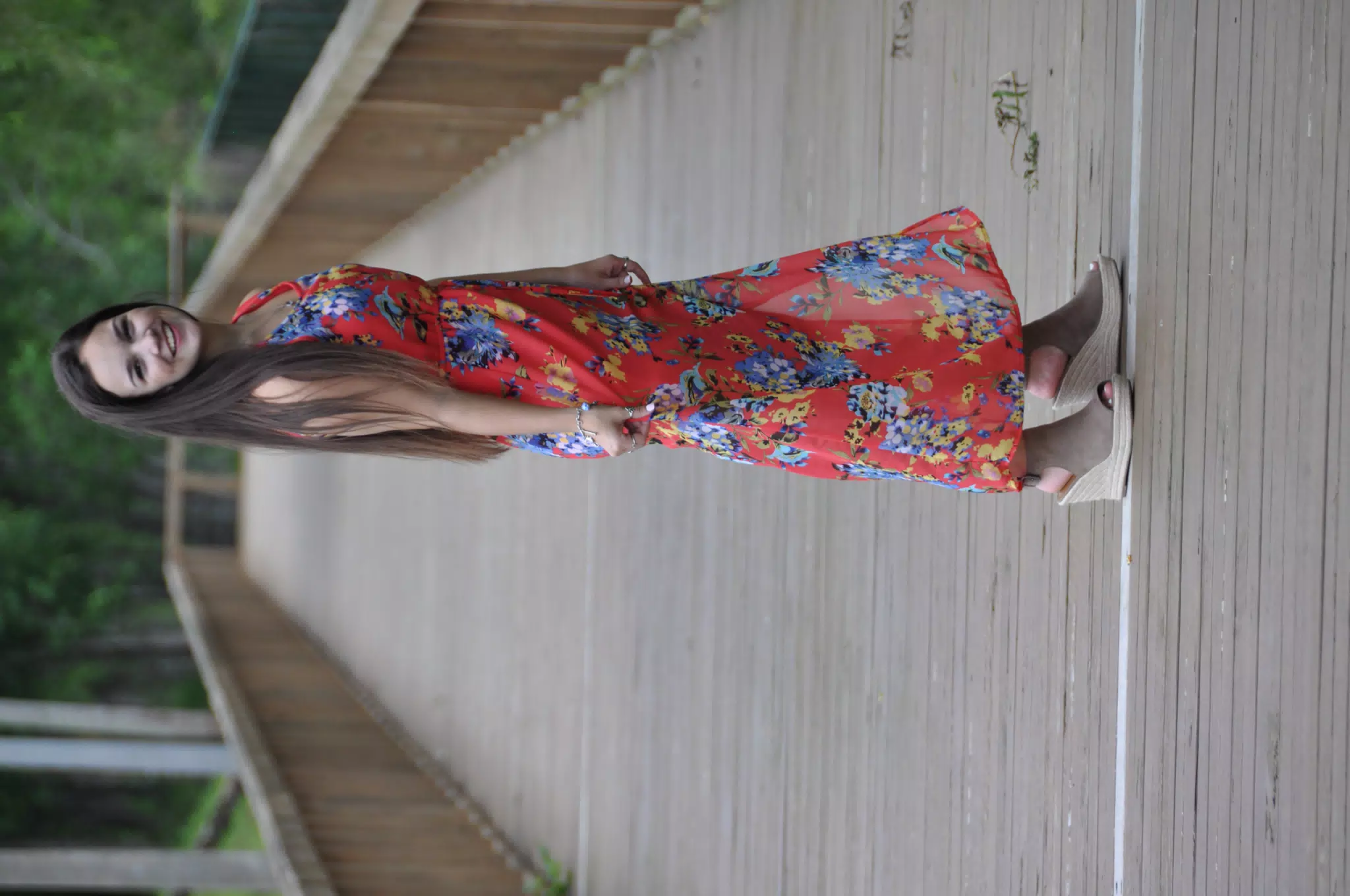 Teen Brunette Model in Red Dress on Boardwalk by Pond in Texas
