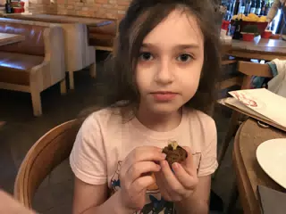 Liesl Eating Cake in Kiev
