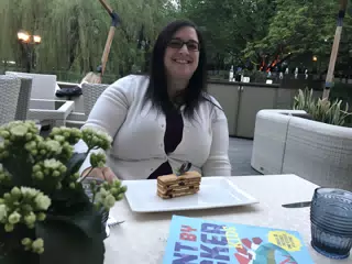 Dominica Eating Dessert in Kiev, Ukraine