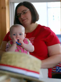Dominica Holding Liesl at the Fourth of July
