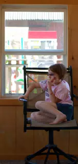 Madeline in Chair on Fourth of July