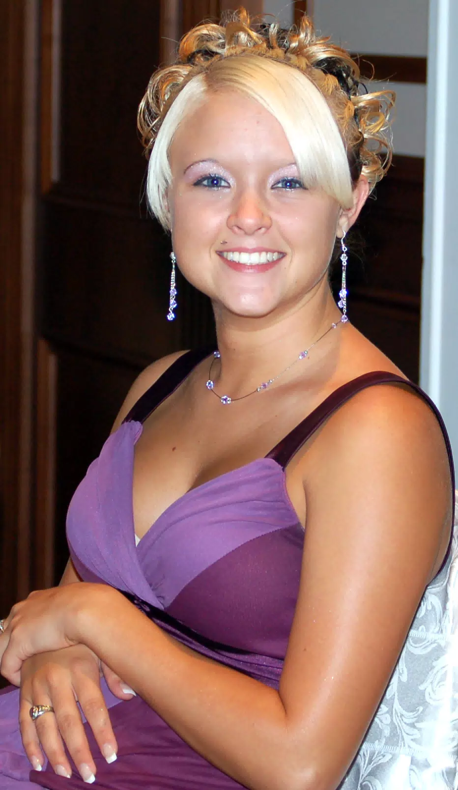 Monica Lillie Sitting at Head Table