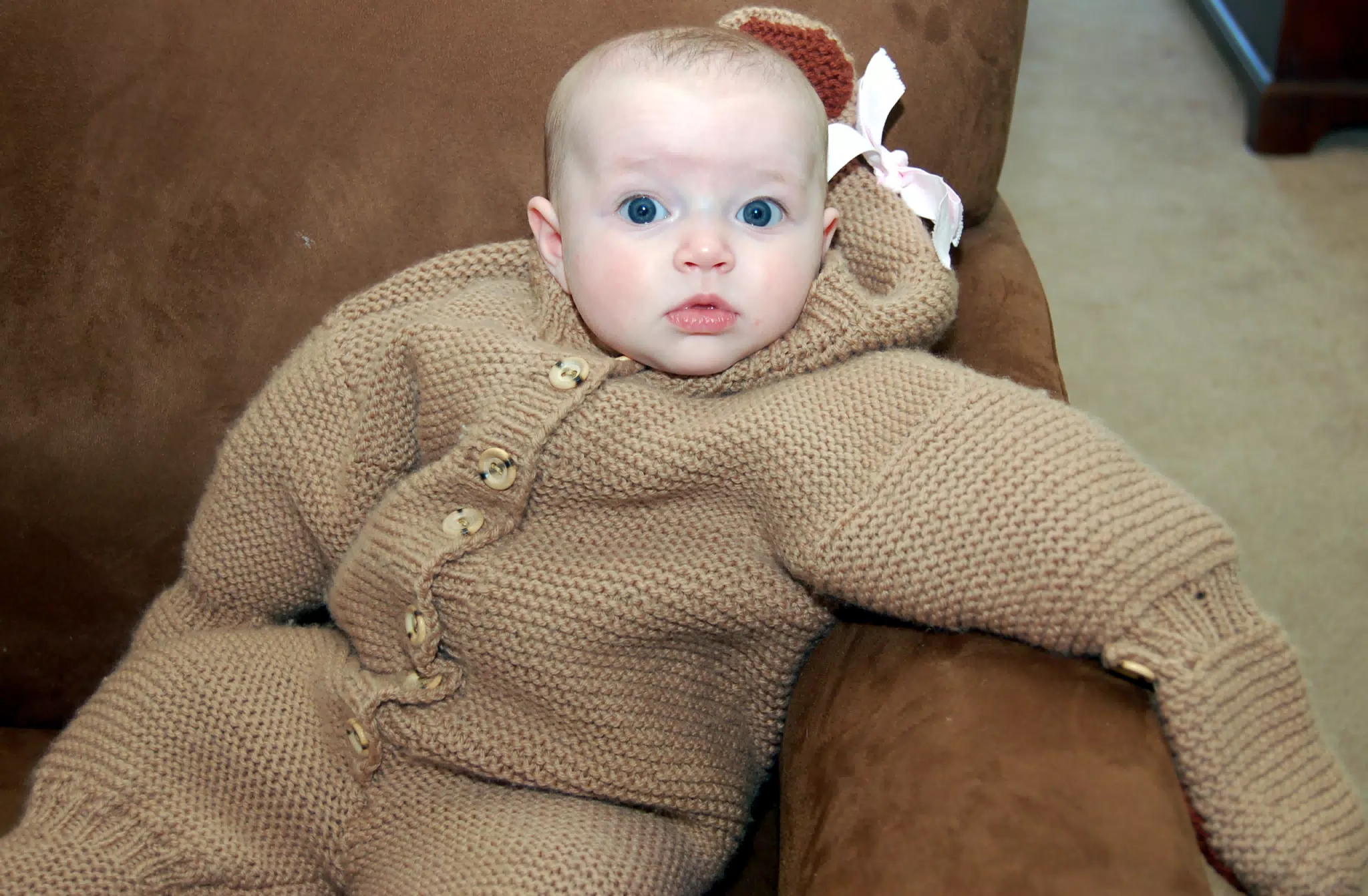 Liesl Lounging in Her Bear Suit on Sofa