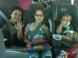 Kids in the Car as we leave Utica