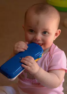 Liesl Playing with Her Toy Phone