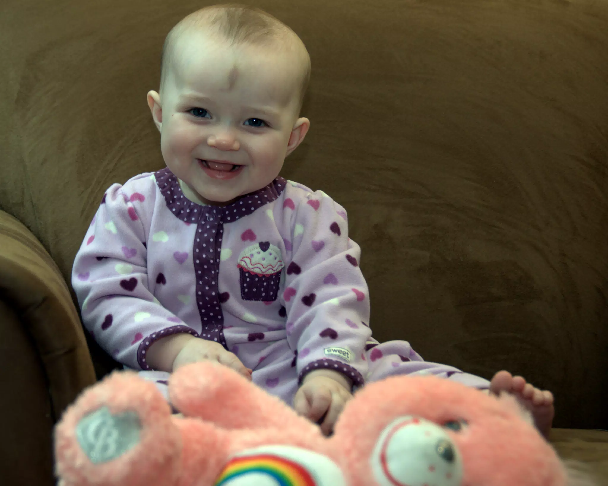 Liesl Smiling Over Cheer Bear