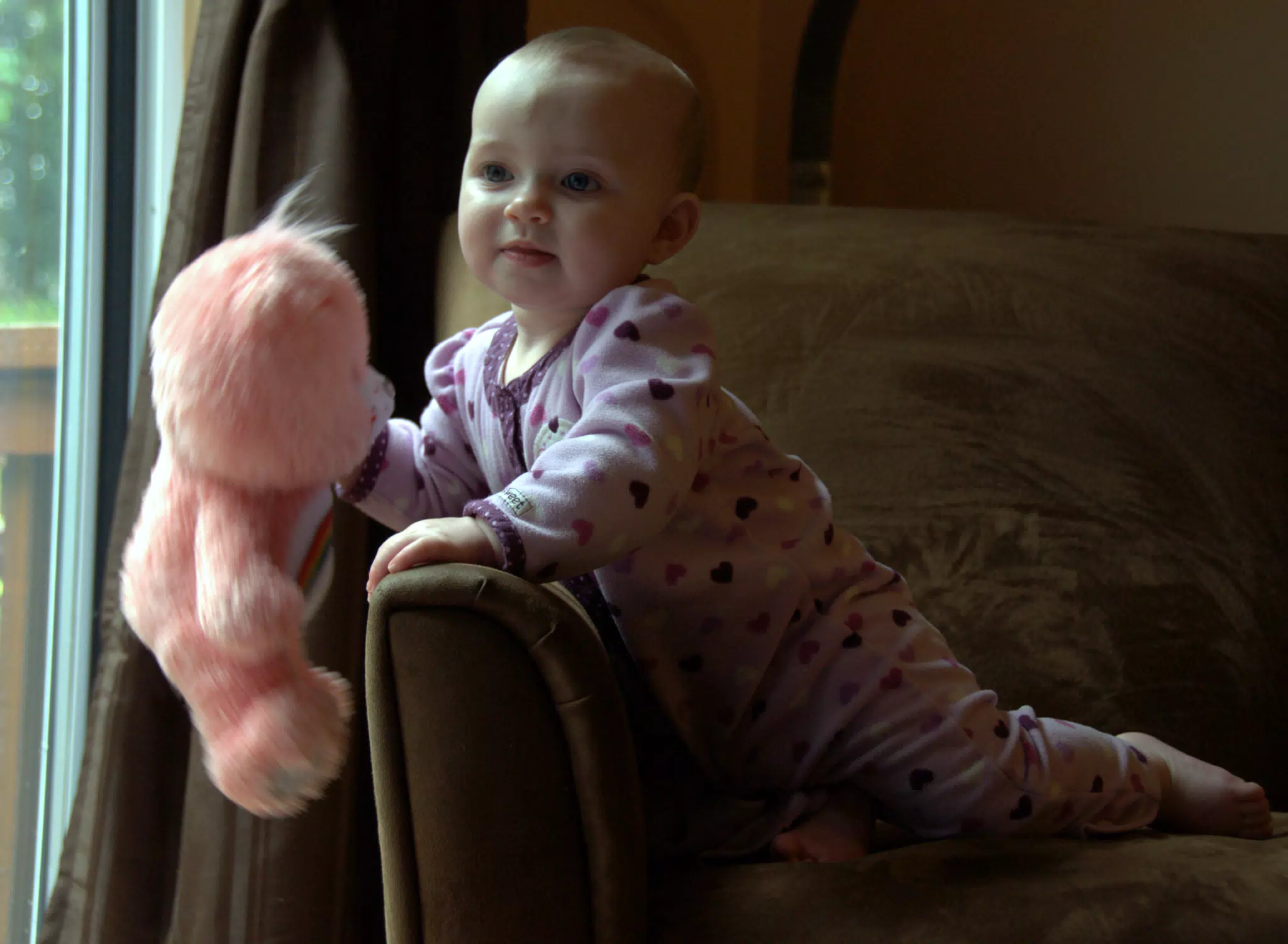 Liesl Playing with Cheer Bear