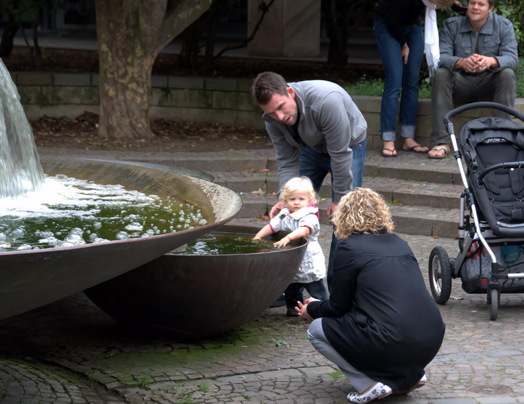 Child Playing in the Fountain