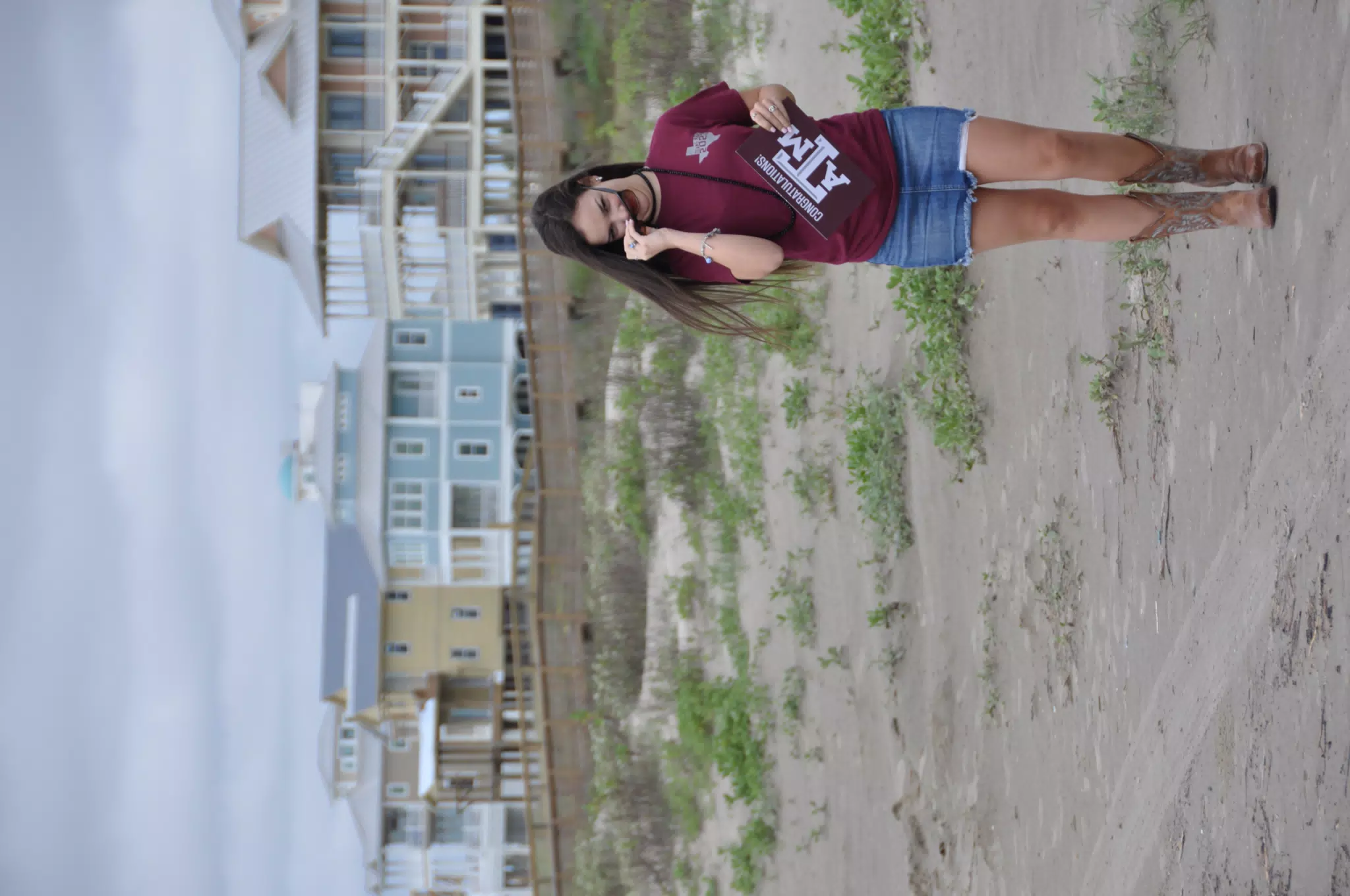 Emily Putting on Sunglasses on the Beach on Galveston Island