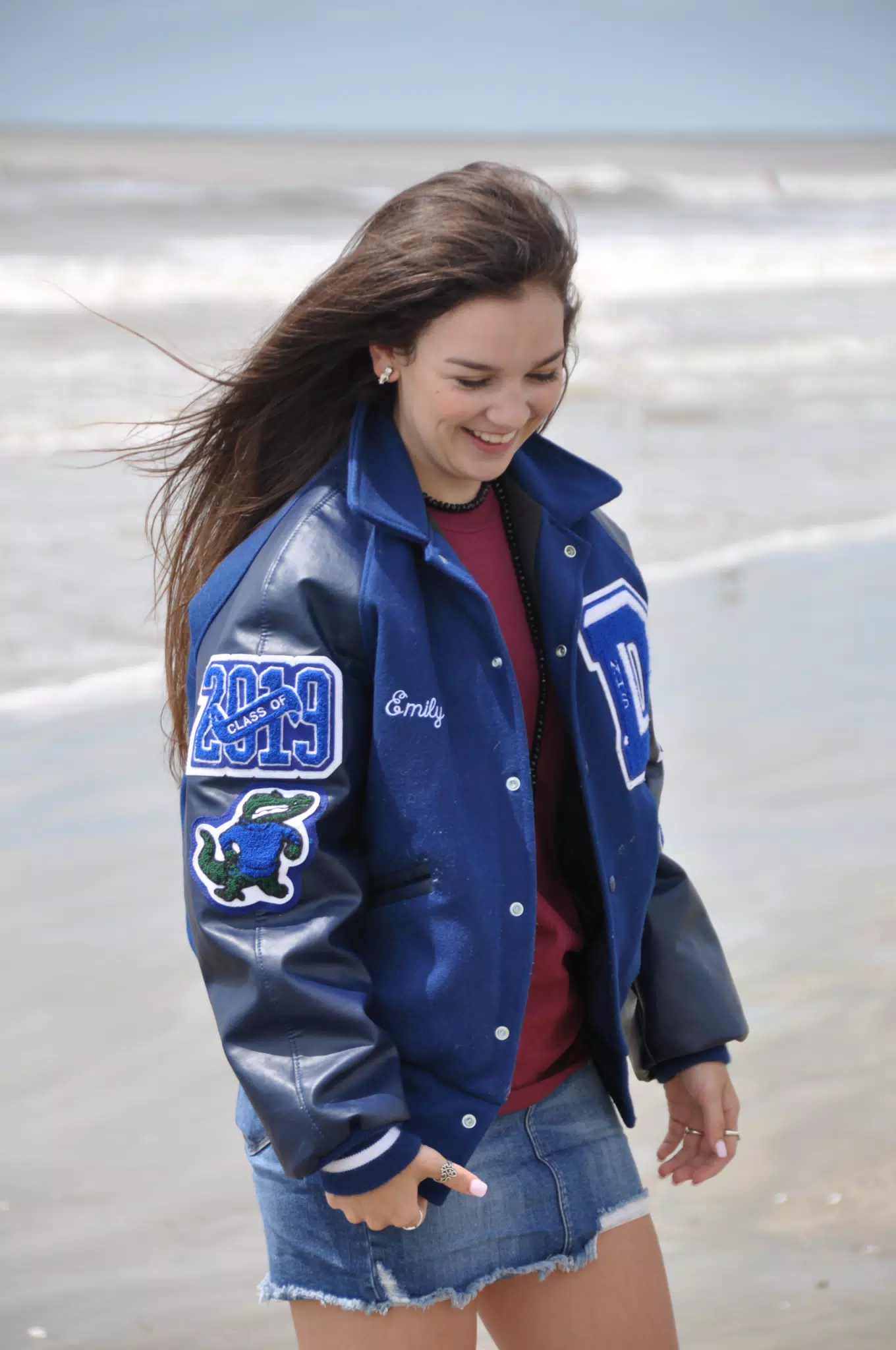 Model in Letterman Laughing During Modeling Shoot