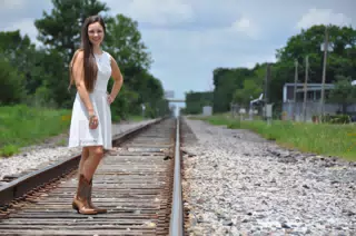 Girl on Railroad Tracks