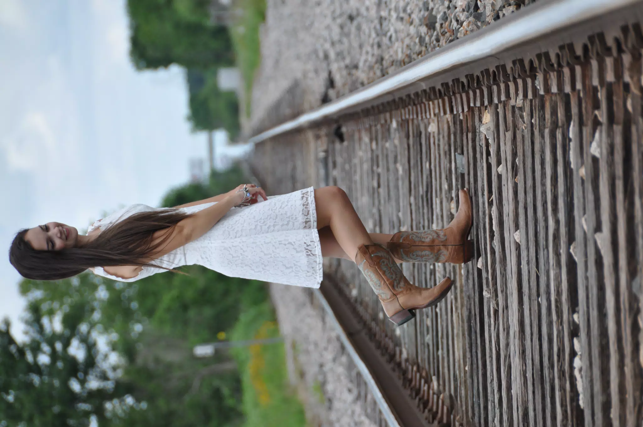 Cowgirl Model in Texas in White Dress, Railroad Tracks, Boots