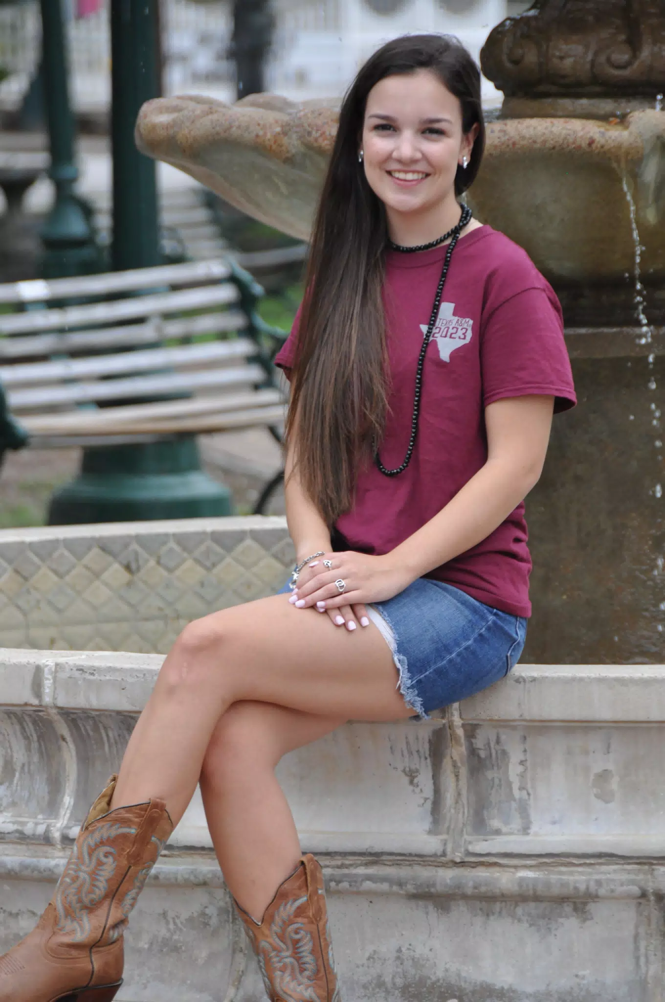 Emily Sitting on Fountain in Texas