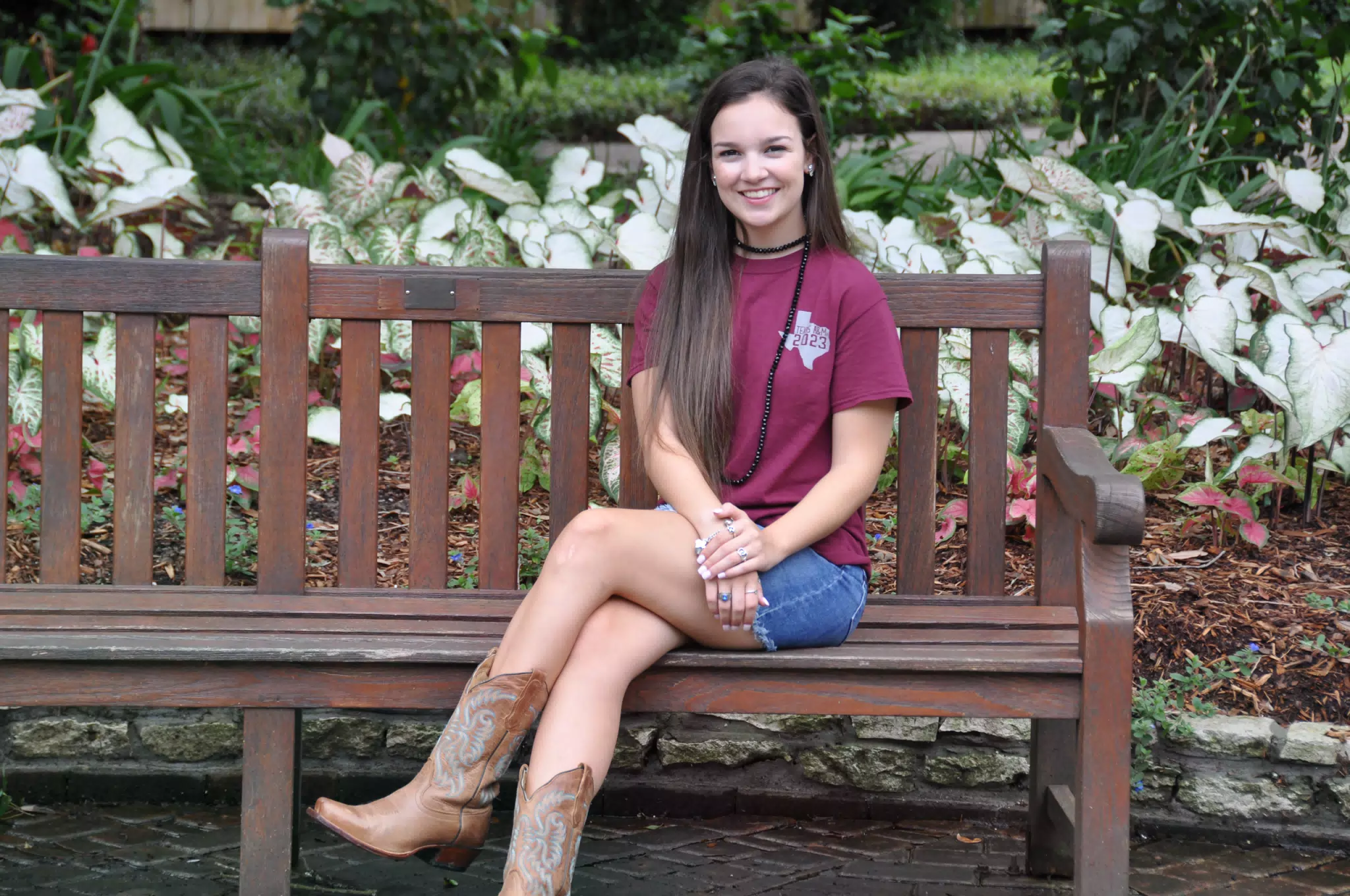 Emily in Cowgirl Boots Sitting on Park Bench in Texas