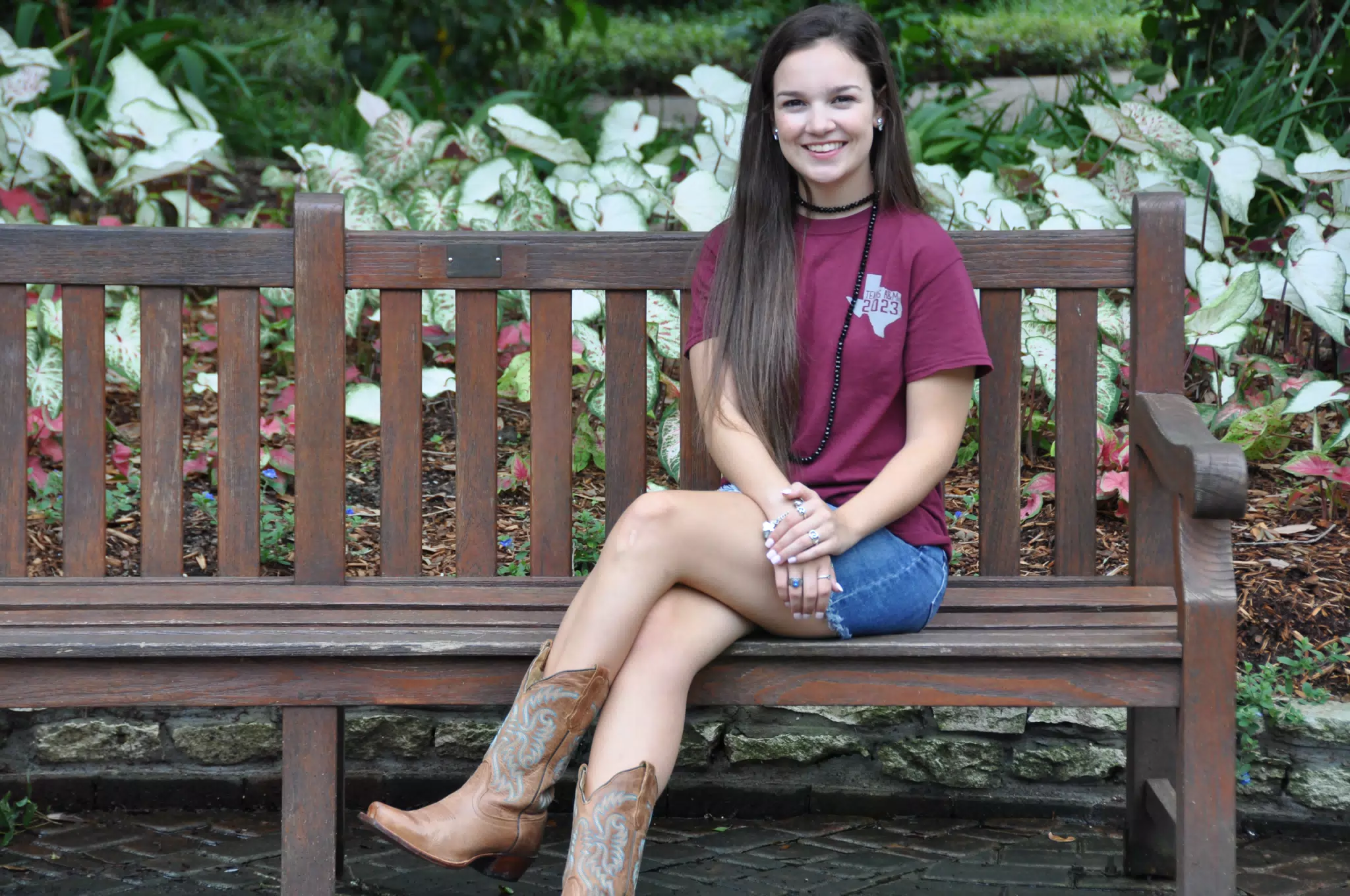 Emily on Park Bench in Mini Skirt and Boots