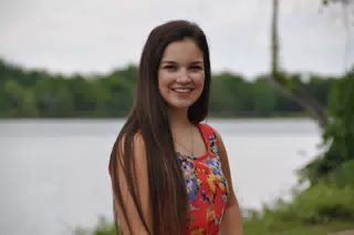 Portrait of Young Girl by Pond