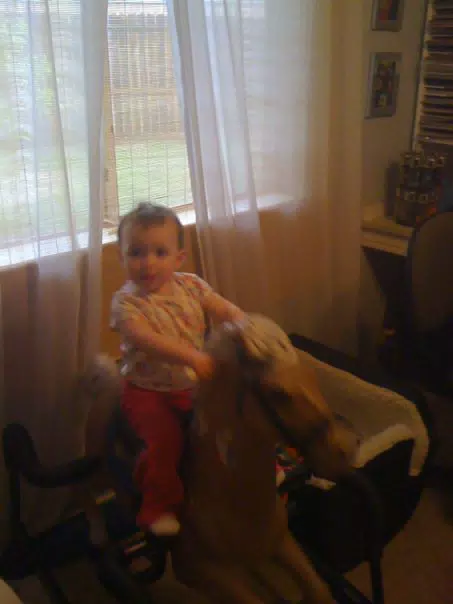 Liesl on Rocking Horse as a Baby