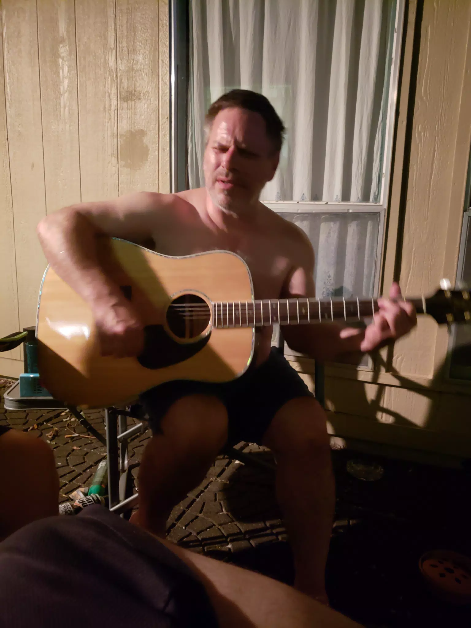 Paul Playing Guitar in the Atrium